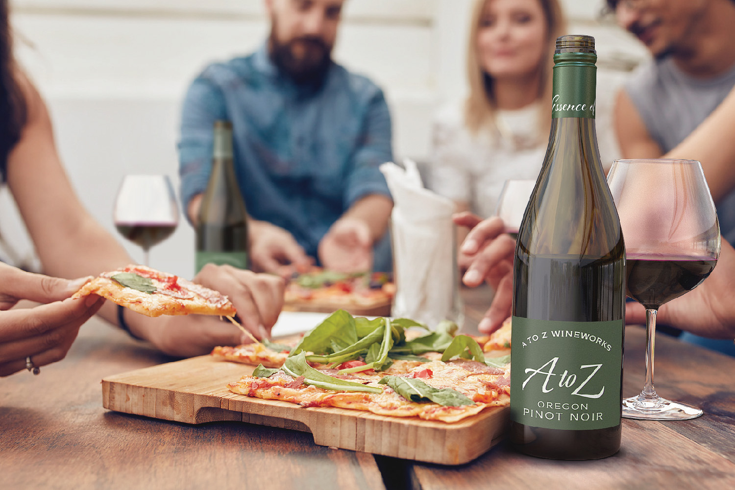 A to Z Pinot Noir with pizza at party